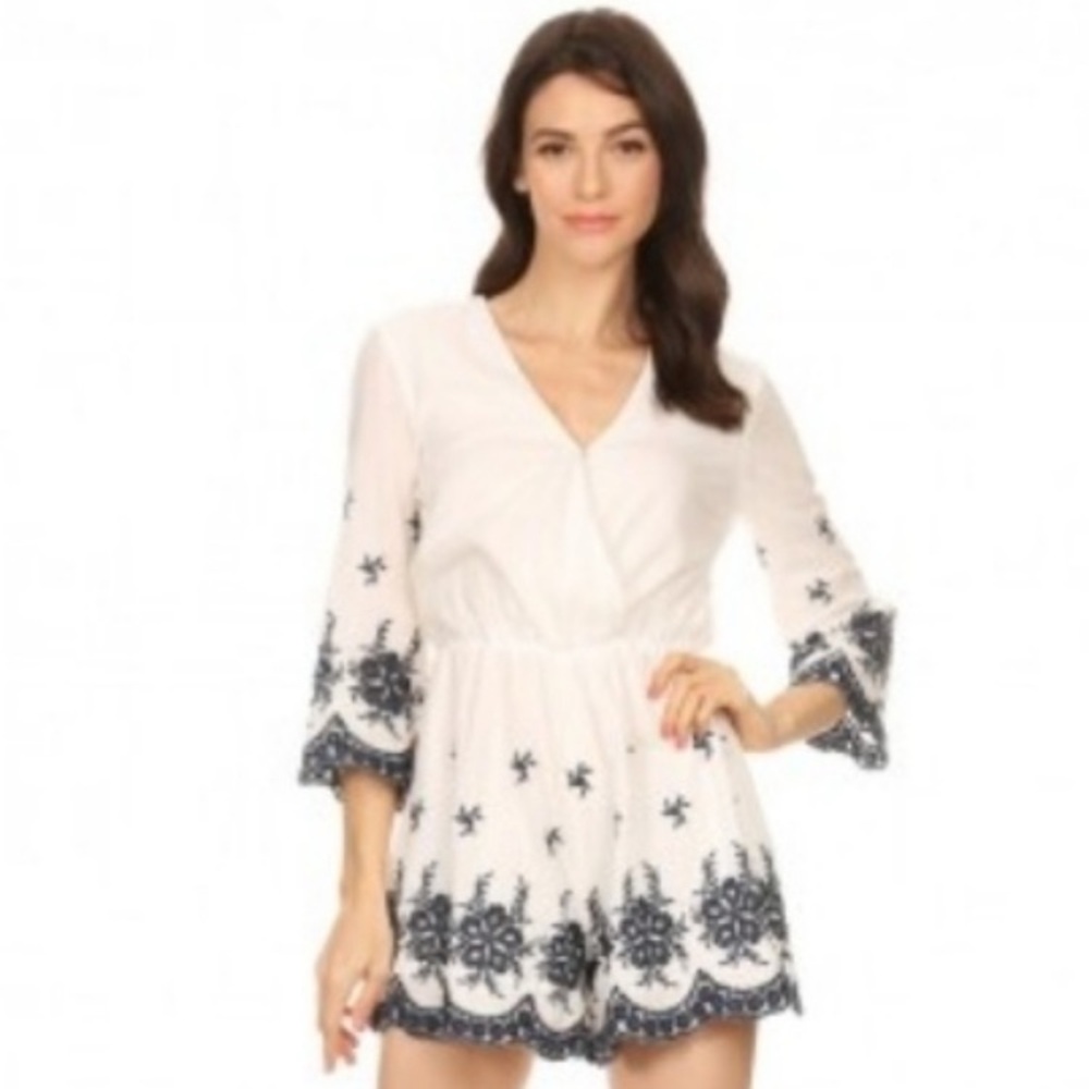 TRAC Womenβs Floral Embroidered Romper